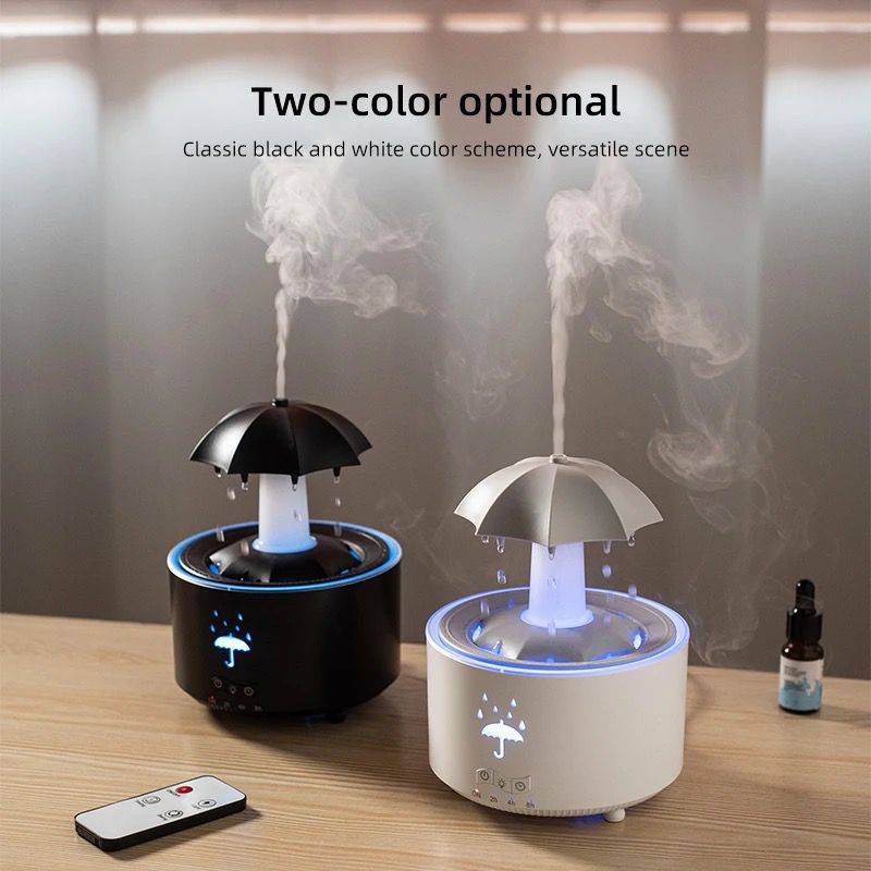 Water Drop Aroma Diffuser available in black and white, featuring raindrop simulation, LED lighting, and remote control for a serene atmosphere.